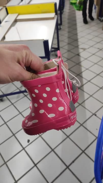 Pink polka-dot children’s rain boots